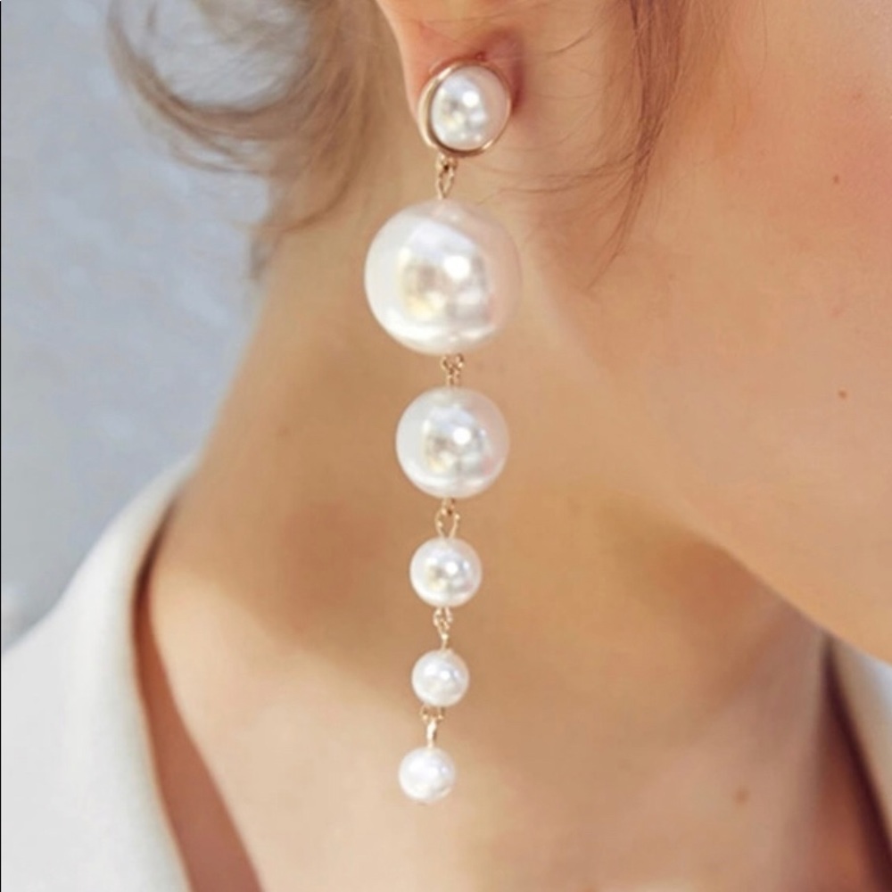 Long faux pearl earrings